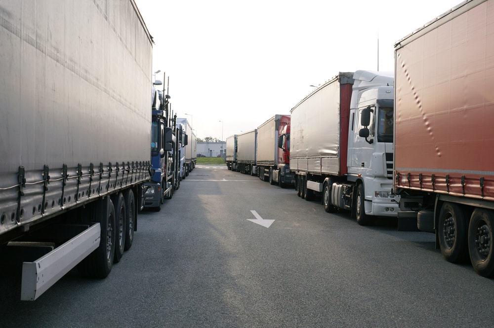 Semi trucks parked in a row