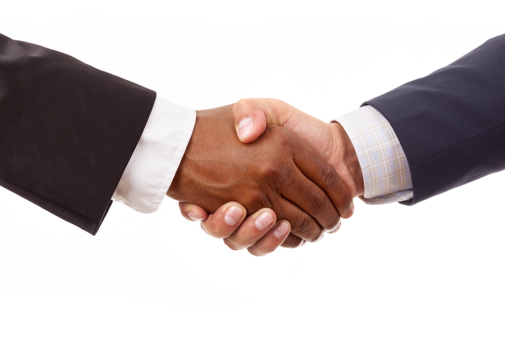 Two people shaking hands