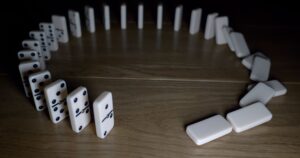 dominoes falling in a circle